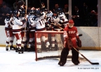 As USSR backup Goalie Vladislav Tretjak (20) contemplates his team's loss, Team USA celebrate their 4-3 upset defeat of the Soviets at the XIII Winter Olympics on February 22, 1980, at Lake Placid, N.Y.