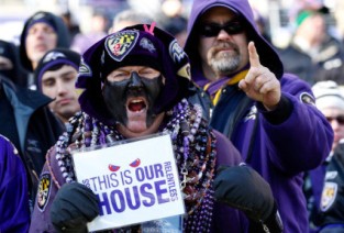 BALTIMORE, MD - JANUARY 15: Fans of the Baltimore Ravens cheer prior to the start of the AFC Divisional playoff game against the Houston Texans at M&T Bank Stadium on January 15, 2012 in Baltimore, Maryland. (Photo by Rob Carr/Getty Images)