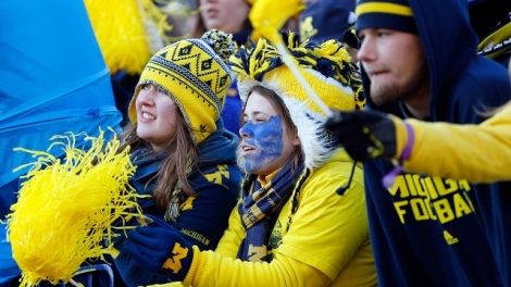 ANN ARBOR, MI - NOVEMBER 30: Michigan Wolverines fans look on against the Ohio State Buckeyes during a game at Michigan Stadium on November 30, 2013 in Ann Arbor, Michigan. (Photo by Gregory Shamus/Getty Images)
