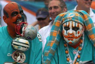 MIAMI GARDENS, FL - DECEMBER 15: Miami Dolphins fans were dressed for the occasion with painted faces as the New England Patriots take on the Miami Dolphins at SunLife Stadium. (Photo by Barry Chin/The Boston Globe via Getty Images)